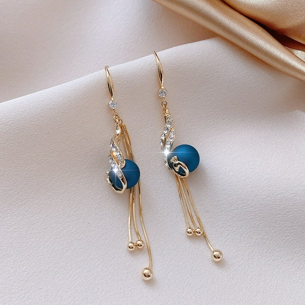 🔥 Aretes de pavo real — una joya exclusiva para mujeres con estilo. 💎 Elegancia, distinción y brillo en cada detalle. ✨ Diseño de lujo para quienes no aceptan lo común.