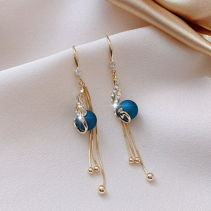🔥 Aretes de pavo real — una joya exclusiva para mujeres con estilo. 💎 Elegancia, distinción y brillo en cada detalle. ✨ Diseño de lujo para quienes no aceptan lo común.
